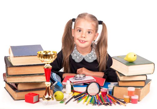 schoolgirl with books and school supplies isolated on white background.