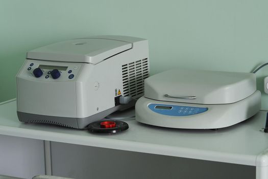 Medical, biological laboratory. Laboratory equipment and devices for medical, biological and scientific research. Thermoshaker, centrifuge.