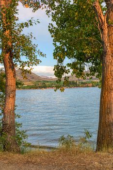 Golden sunset on Osoyoos lake. Summer season in Okanagan valley.