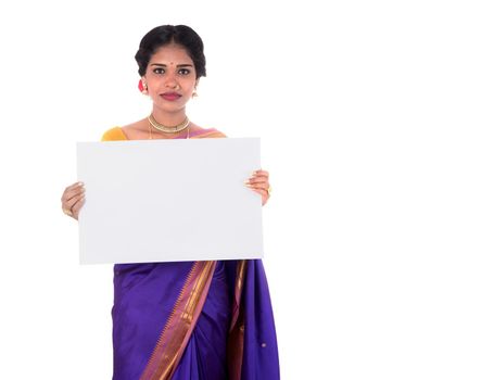 Traditional Girl holding and showing blank white sign board