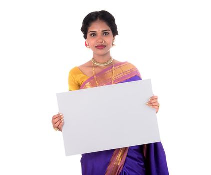 Traditional Girl holding and showing blank white sign board