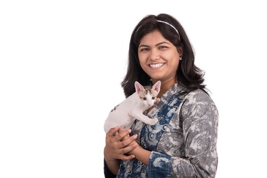 young attractive girl with cat on white background