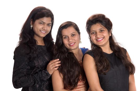 Portrait of happy young girls on a white background