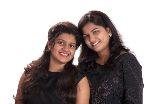 Portrait of happy young girls on a white background