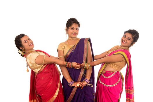 Traditional Beautiful Indian young girls in saree posing on white background