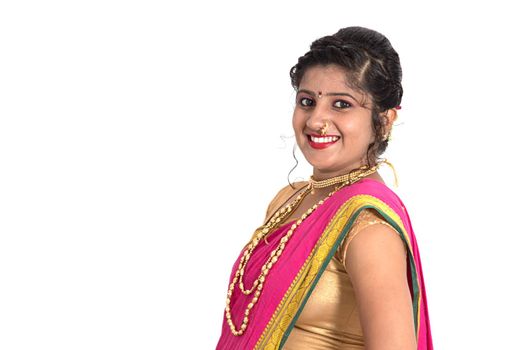 Close up of Beautiful Indian Traditional young girl in saree on white background