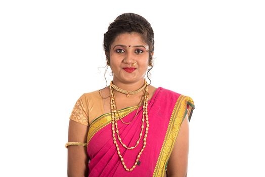 Close up of Beautiful Indian Traditional young girl in saree on white background