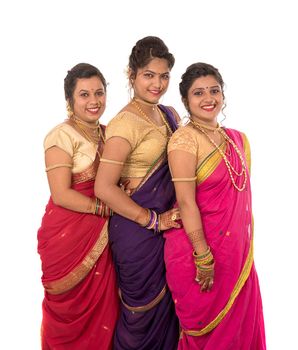 Traditional Beautiful Indian young girls in saree posing on white background