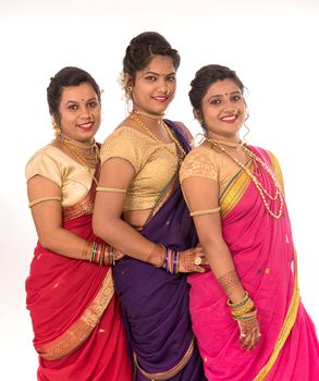 Traditional Beautiful Indian young girls in saree posing on white background