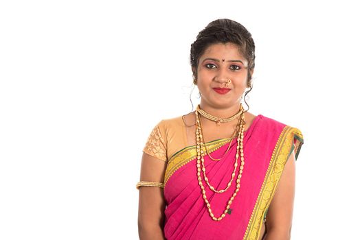 Close up of Beautiful Indian Traditional young girl in saree on white background