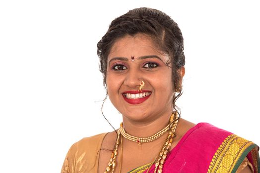 Close up of Beautiful Indian Traditional young girl in saree on white background