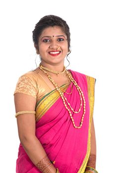 Close up of Beautiful Indian Traditional young girl in saree on white background