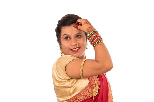 Close up of Beautiful Indian Traditional young girl in saree on white background