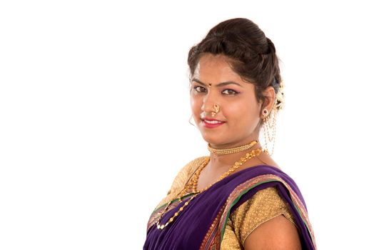 Close up of Beautiful Indian Traditional young girl in saree on white background