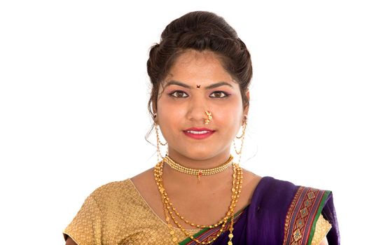 Close up of Beautiful Indian Traditional young girl in saree on white background