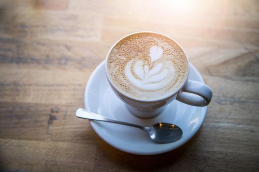 Cup of fresh brewed cappuccino in an Italian café