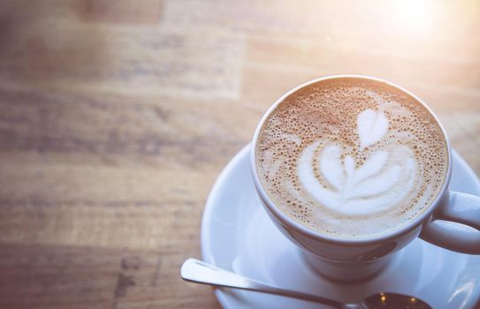 Cup of fresh brewed cappuccino in an Italian café
