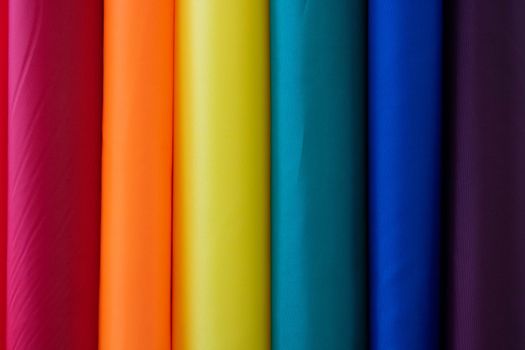 Rainbow background of fabric rolls.The LGBT concept.