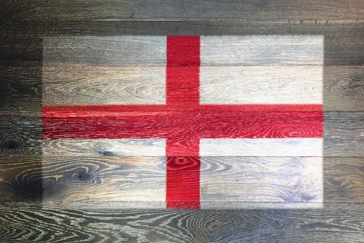 An England flag on rustic old wood surface background