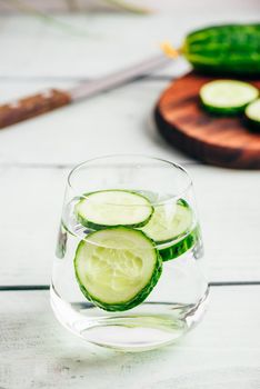 Detox water with sliced cucumber in a drinking glass