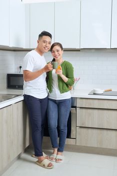Full-length image of romantic couple at home