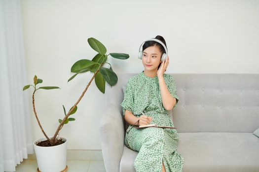 Ordinary female asian teen portrait at home sofa remote education concept. 
