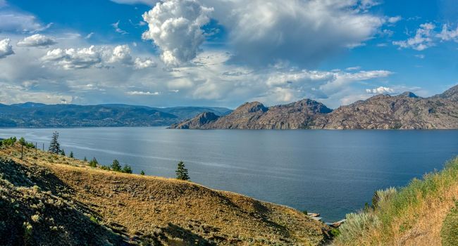 Panoramic view over Okanagan lake on a summer day in Canada.