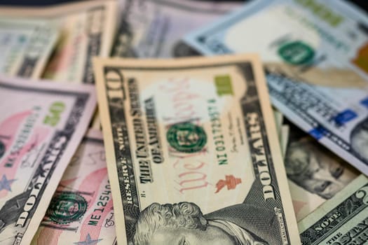 Selective focus on detail of USD banknotes. Detail of United States currency USD banknotes. World money concept, inflation and economy concept