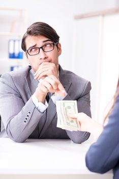 Businessman being offered bribe for breaking law