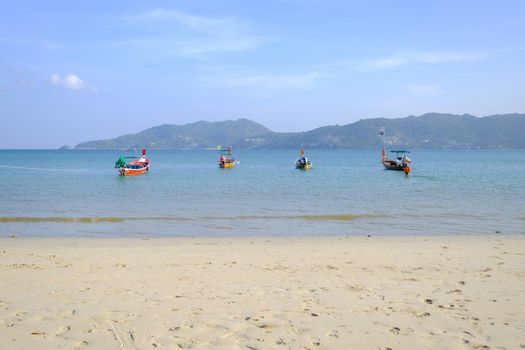 Fishing boat moored at beach Phuket Thailand