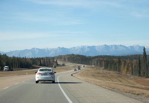 a first glimpse of the canadian rocky mountains from the trans canada highway in Obed / Hinton, Alberta 
