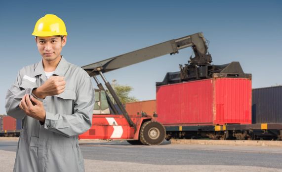 Foreman stand on front forklift loading Containers box to Logistic cargo Import Export