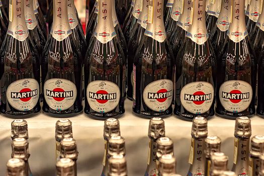 Rows of bottles of Asti Martini bottles in store. Surgut, Russia - 25 December, 2019