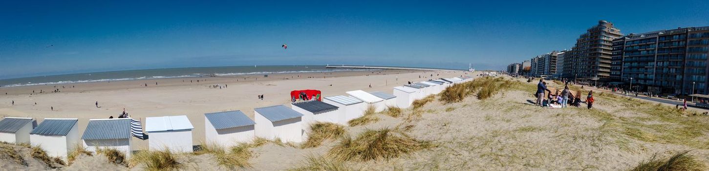 Panoramic view from a dune on the beach of Nieuwpoort on a sunny springday