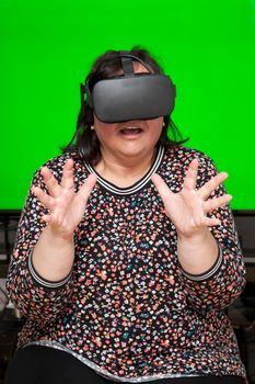 Person with virtual reality headset is experiencing shock and fear 