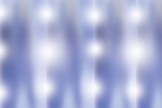  Spots of light appear throughout a blue toned abstract or wallpaper