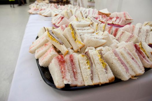  Roast beef and mustard, and cream cheese and cherry finger sandwiches 