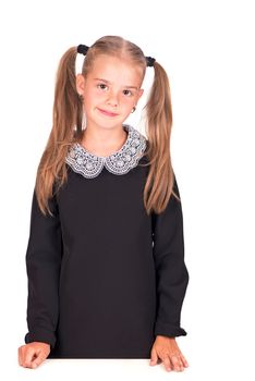 portrait of the youngest schoolgirlisolated on white background.