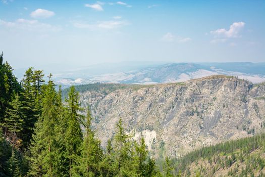 View on Okanagan valley with mountains tops covered with smoke from wildfires