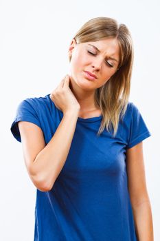 Young woman is having neck pain.