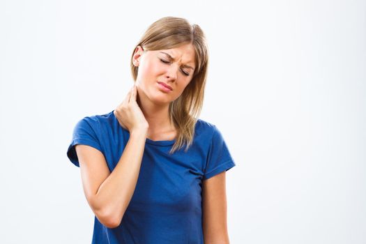 Young woman is having neck pain.