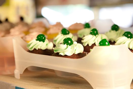 Little cupcakes decorated with green icing for St. Patrick's day