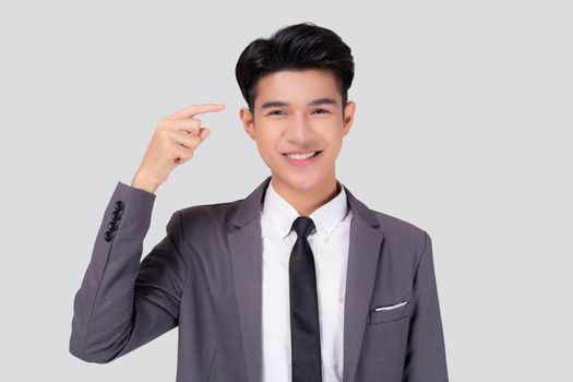 Portrait young asian business man in suit with smart thinking idea with intelligent isolated on white background, businessman standing and planning for success, manager or executive pointing head.