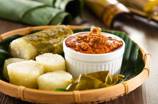 Lemang. Glutinous rice is wrapped with lerek or banana leaf encased in bamboo culm and cooked in open fire.