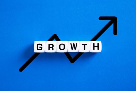 Financial growth word over blue background. Finance Concept