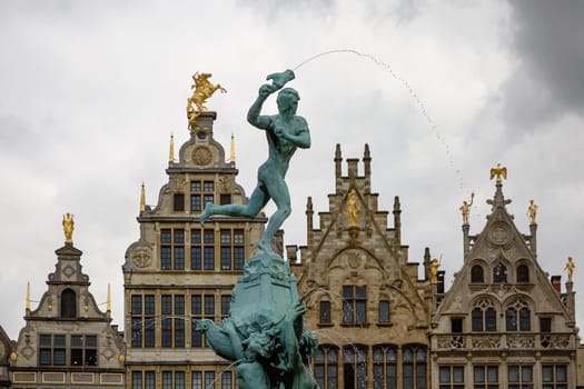 Brabo fountain and traditional flemish architecture at Grote Markt square in Antwerp in Belgium.