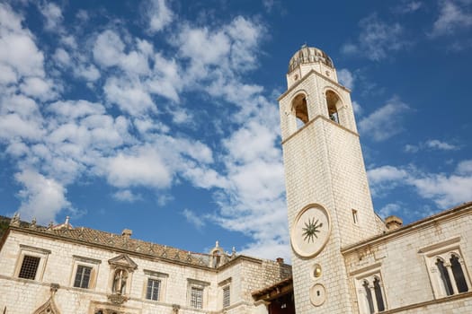 Clock tower, built in 1444, standing next to the Sveti Vlaho (Saint Blaise) Church on the Stradun in Old Town Dubrovnik, Croatia.