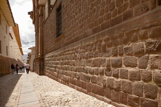 People walking the street of Cusco in Peru