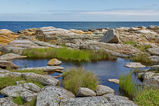 Coast line of Baltic Sea near the village of Svaneke on Island Bornholm in Denmark.