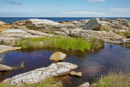 Coast line of Baltic Sea near the village of Svaneke on Island Bornholm in Denmark.